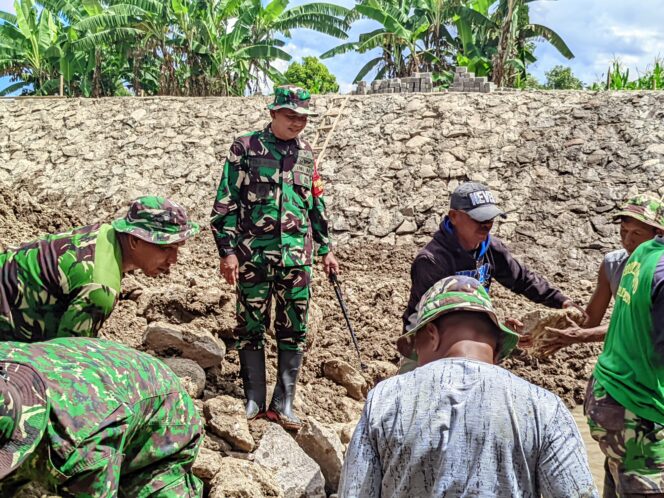 
					Program TNI Manunggal Membangun Desa (TMMD) ke-124. (dok.ist)