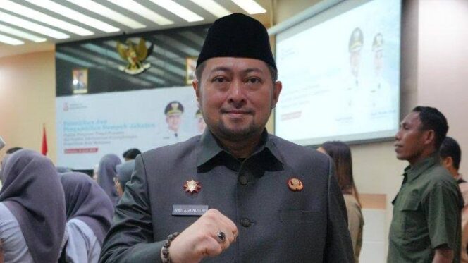 
					Plt Kepala Bapenda Makassar Andi Asminullah. (Dok.ist)