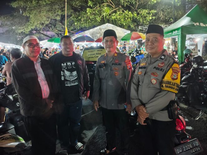 
					Sehari Bersama Anak Panti Asuhan dan Kaum Dhuafa di Mesjid Al-Markaz, Personil Polsek Bontoala Berikan Pengamanan